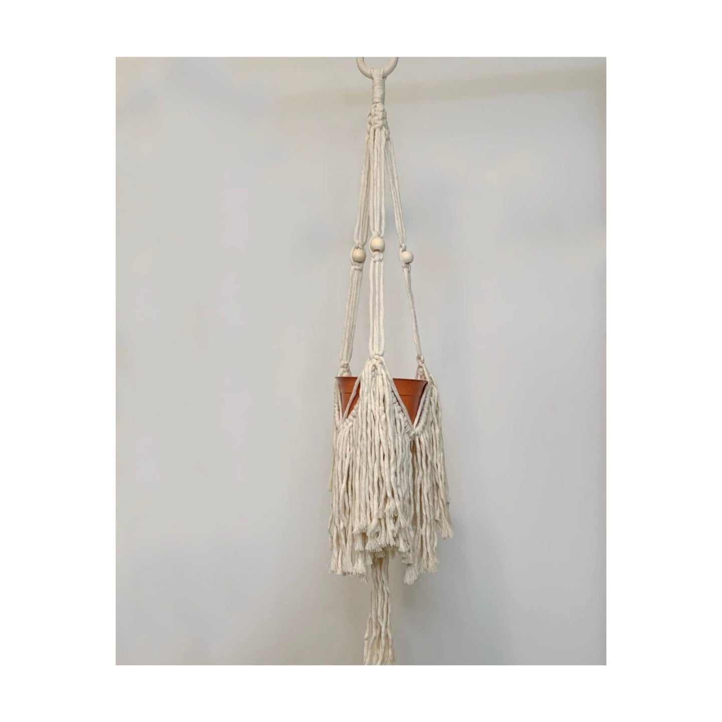 Mini Blanche design has a stylish flare to it with the option of three spiral strands or go with the straight cord design. There are a few wooden beads and fun fringe at the bottom.