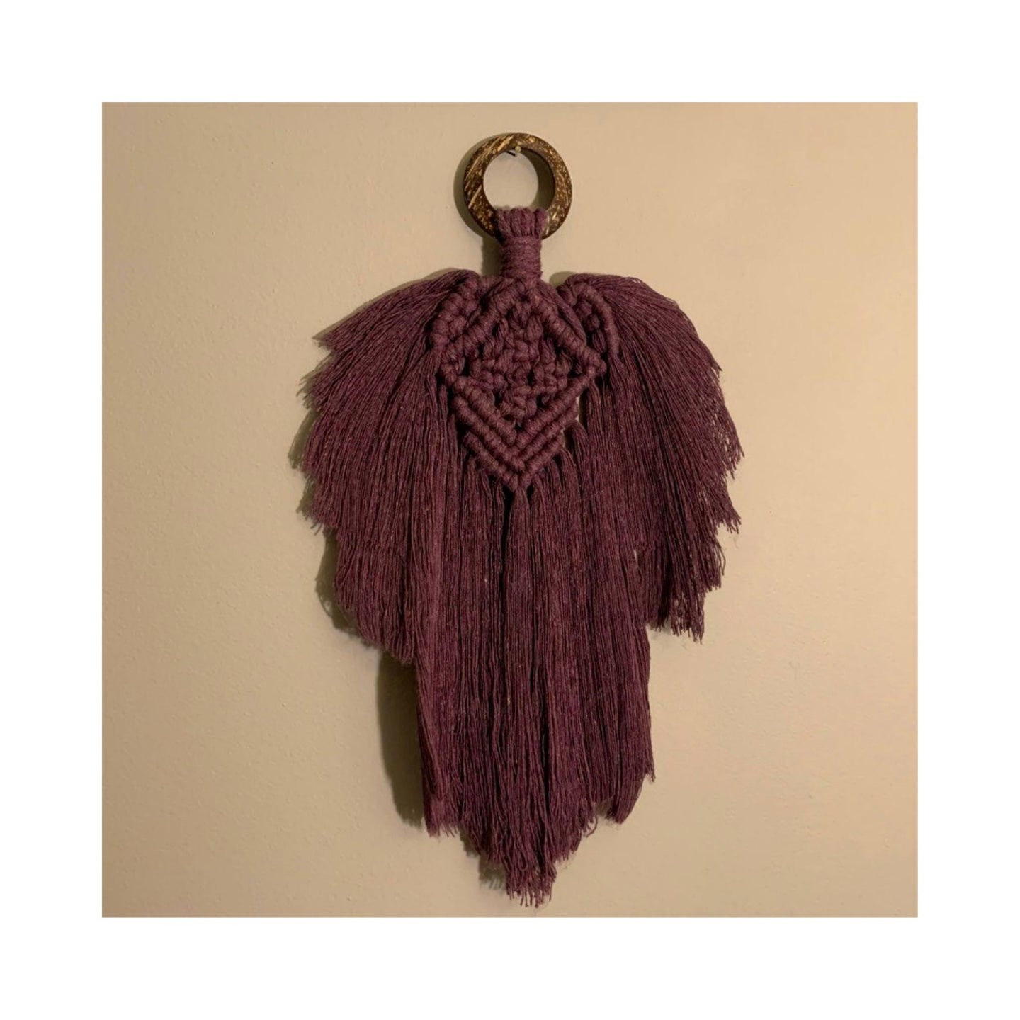 Raven is a beautiful macrame feather that’s the perfect accent for your wall. The ring has a gorgeous unique look as it’s made from coconut shell. You can mix and match any of the feathers or request them to be made in a variety of colors.