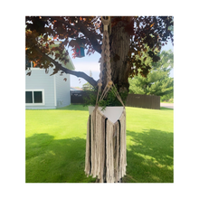 Load image into Gallery viewer, Fringed macrame plant hanger with multi colored fringed recycled cotton cord and a few beads for accent.
