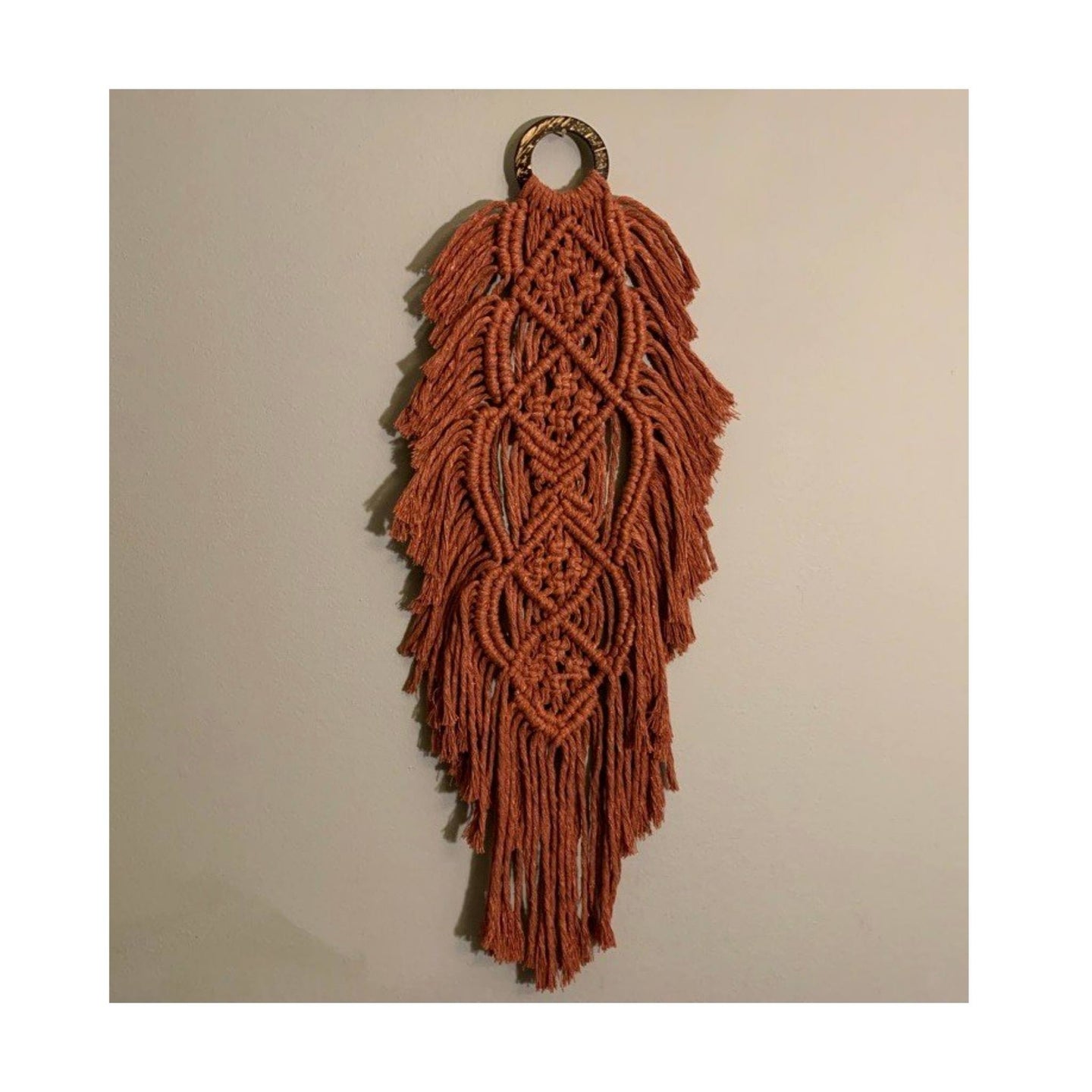 Phoenix is a beautiful macrame feather that’s the perfect accent for your wall. The ring has a gorgeous unique look as it’s made from coconut shell. You can mix and match any of the feathers or request them to be made in a variety of colors.