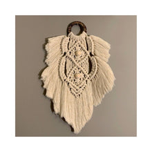 Load image into Gallery viewer, Nightingale is a beautiful macrame feather that’s the perfect accent for your wall. The ring has a gorgeous unique look as it’s made from coconut shell. You can mix and match any of the feathers or request them to be made in a variety of colors.

